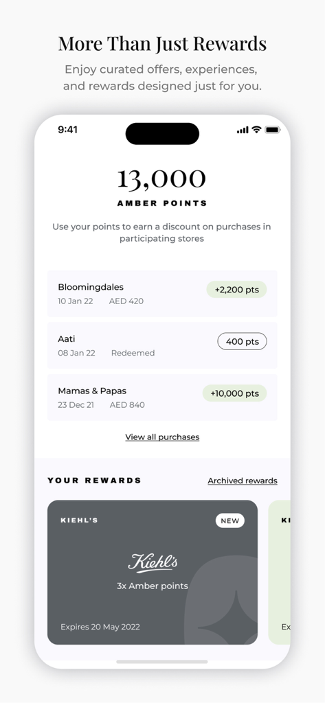 Oberfläche der Amber-App, die den Treuepunktestand und die letzten Einkäufe bei Luxusmarken wie Bloomingdales anzeigt