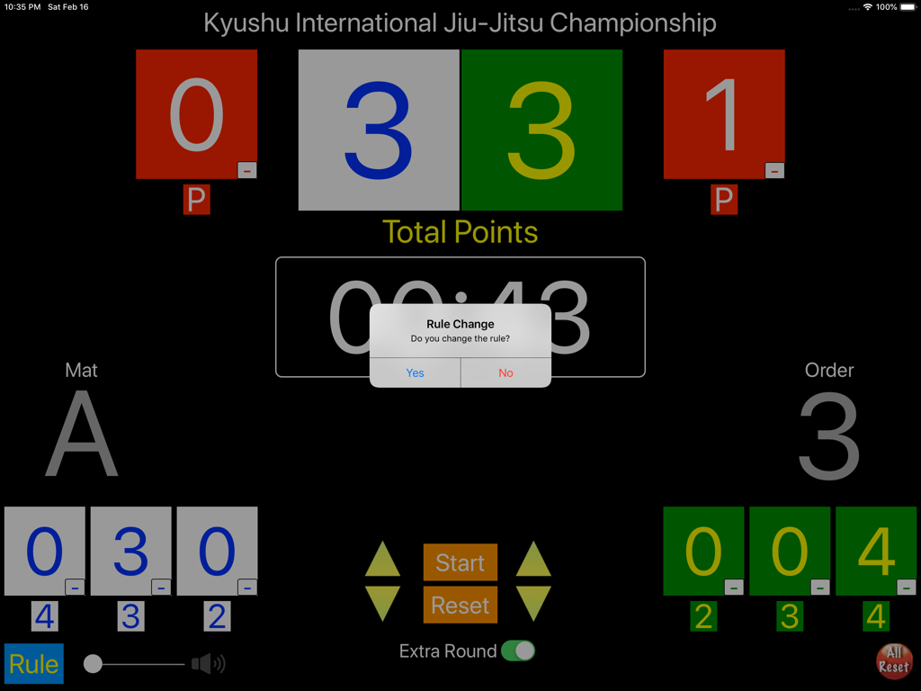 Jiu-Jitsu Board app interface on an iPad showing a digital scoreboard for a BJJ championship with points, timer, and rule change prompt.
