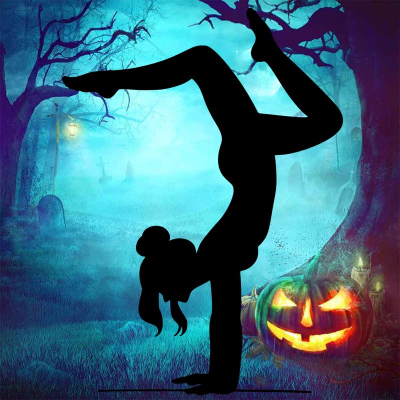 a woman doing a handstand