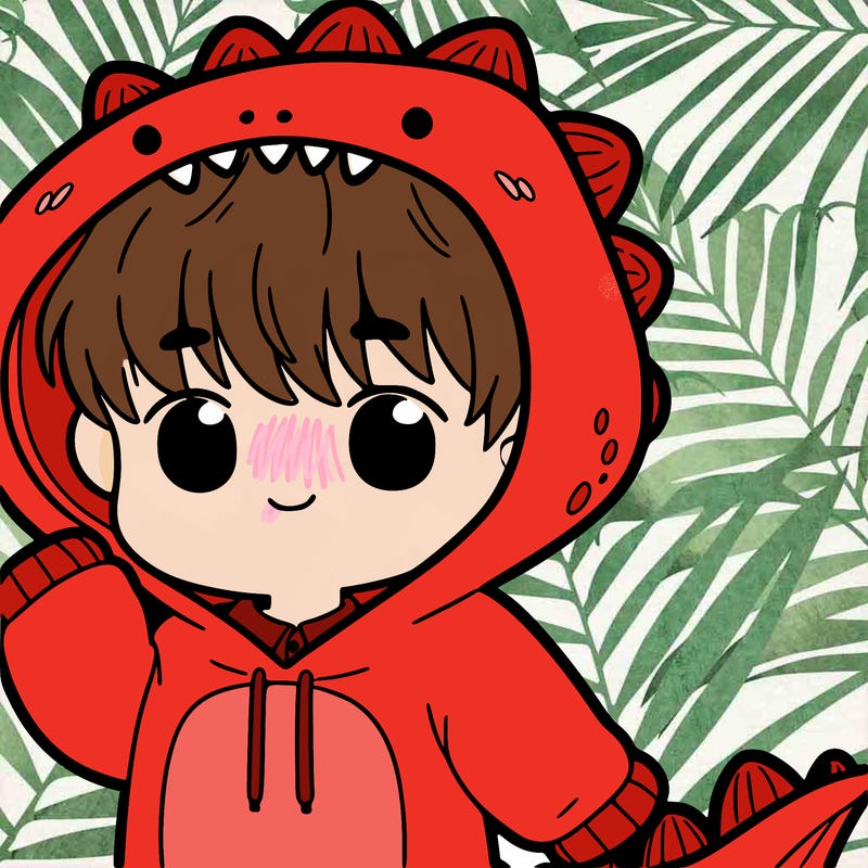 a boy with a cute dino hoodie