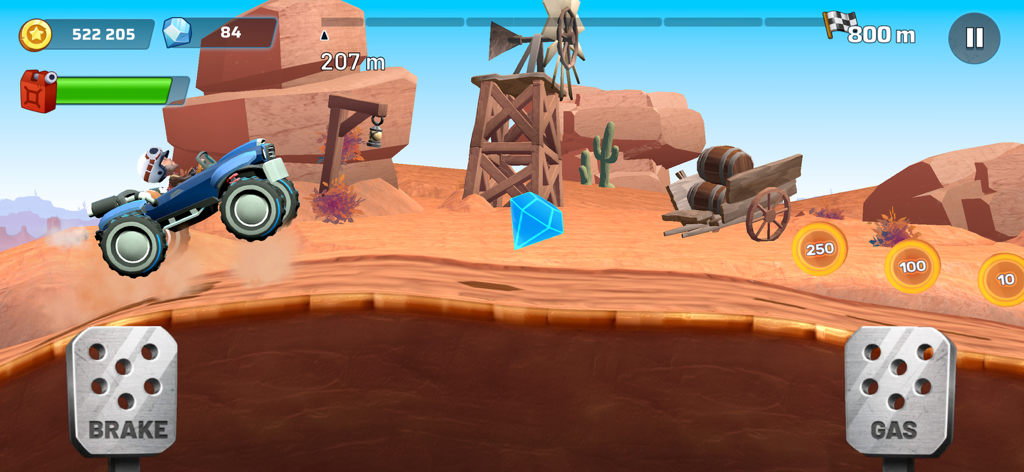 Mountain Climb Jump - Blue car driving uphill in a desert canyon with gas and brake pedals visible