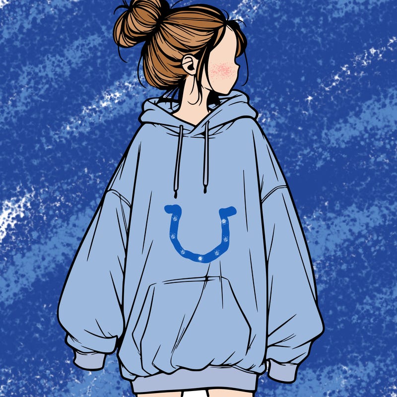 realistic girl with a oversized sweatshirt on and a bun
