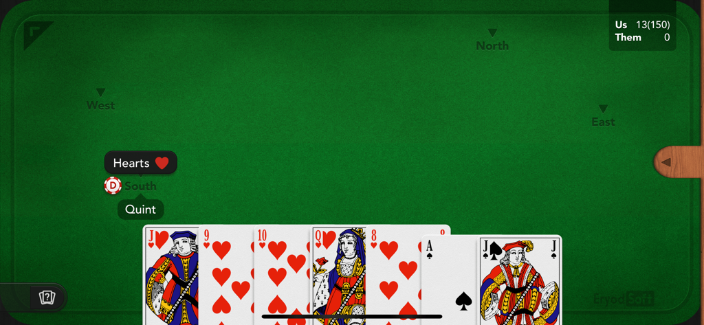 French Belote + - Gameplay of French Belote plus card game showing a hand of hearts and spades on a green table.