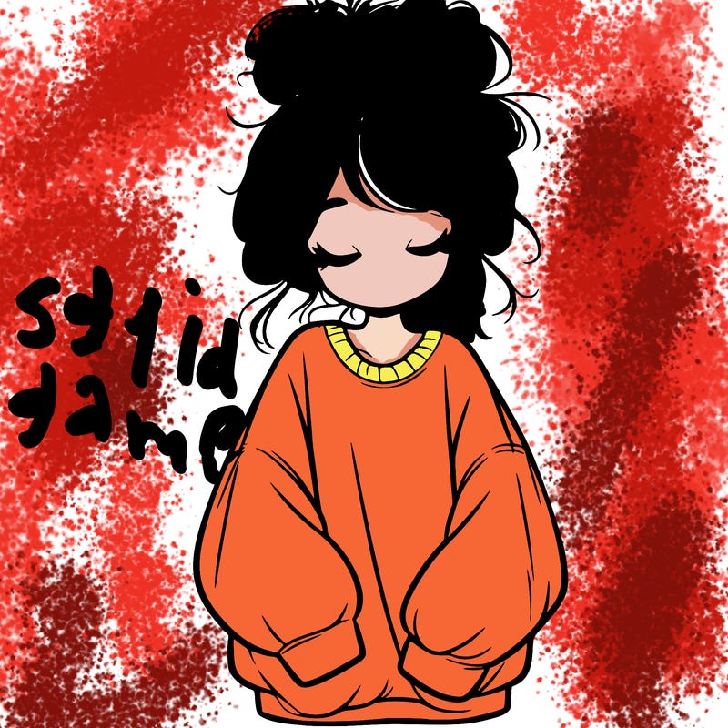 girl with baggy sweatshirt and messy bun