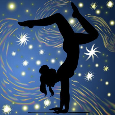 a woman doing a handstand