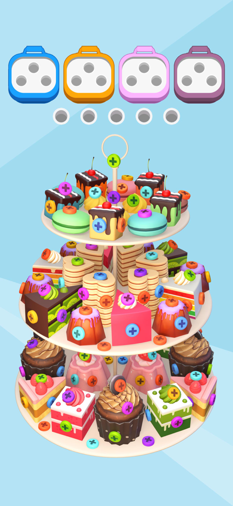 A 3D puzzle game level featuring colorful cakes and cupcakes decorated with bolts on a tiered dessert stand