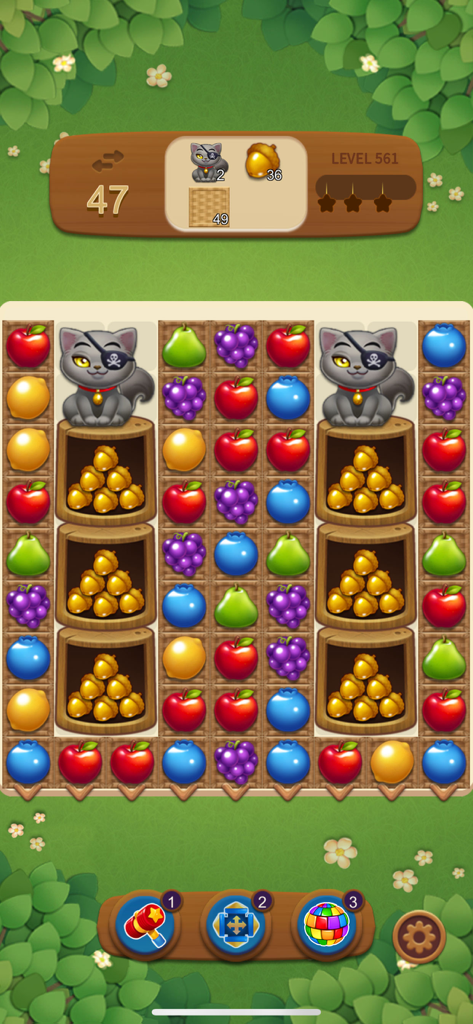 Fruits Magic : Match 3 Puzzle - Pantalla de jugabilidad del puzzle de combinar 3 Fruits Magic con gatos piratas y frutas coloridas.