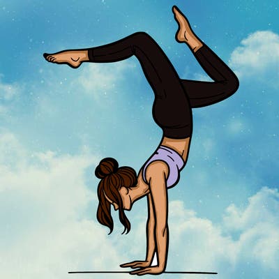 a woman doing a handstand