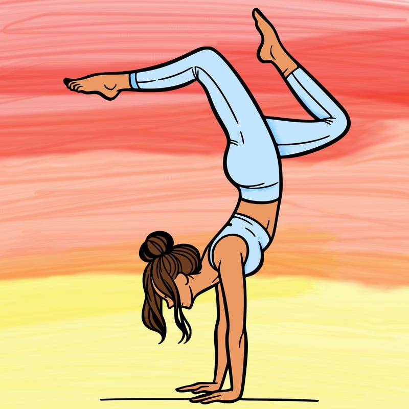 a woman doing a handstand
