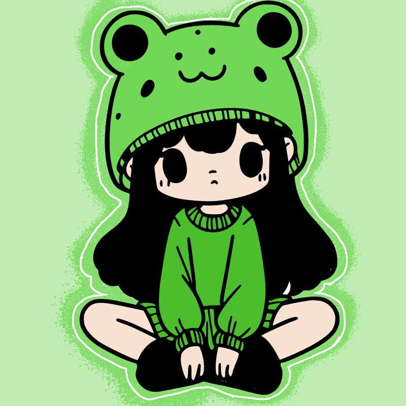 a girl wearing a frog hat and some frog socks