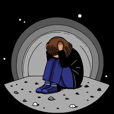 a girl huddled up against the wall on the floor with her hands on her head