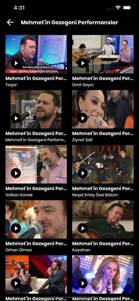 Una schermata nell'app KRAL che visualizza una griglia di video di esibizioni musicali live archiviate con vari artisti turchi.