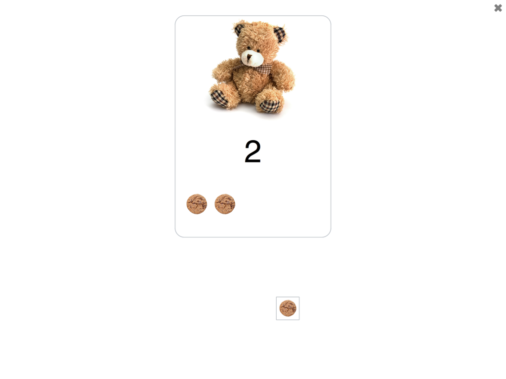 See and Learn First Counting - 数字の2とテディベア、そしてカウンターが2つ、クリアな画面に表示された教育的な数え方アクティビティ。