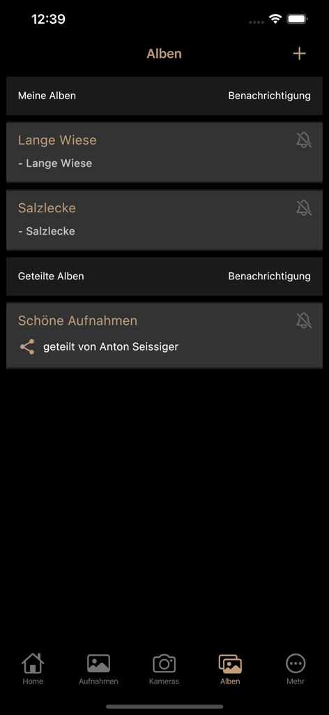 SUPERSIM - SUPERSIM app interface showing organized photo and video albums from trail cameras