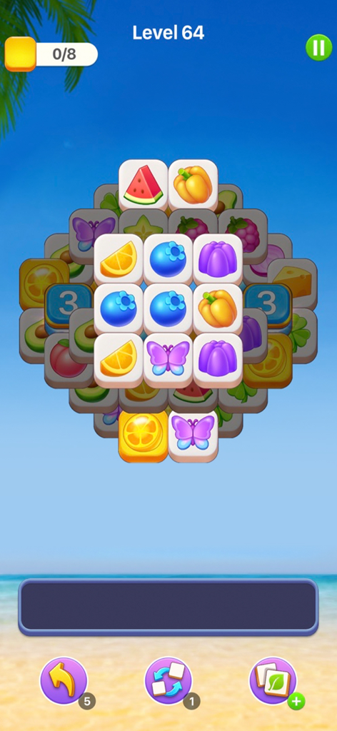 A tile-matching puzzle level in Makeover Tile Help Her featuring fruit and butterfly icons on a beach background
