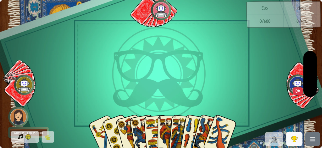 toutigame - Digital interface of the Touti card game with traditional Moroccan cards on a green table.