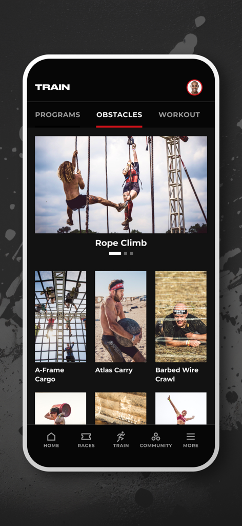 Spartan Race app training interface featuring obstacle tutorials like rope climb and atlas carry.
