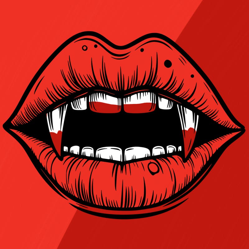lips with vampire teeth