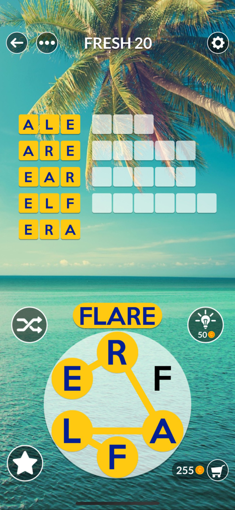 Gameplay de Wordscapes Uncrossed avec un puzzle de mots sur fond de plage tropicale