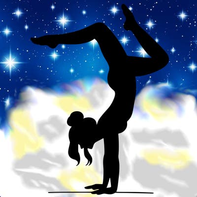 a woman doing a handstand