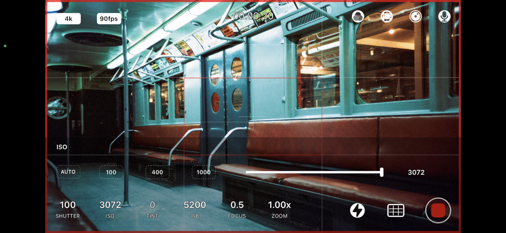 Manual video camera interface in ProCam app showing professional recording settings in a subway car
