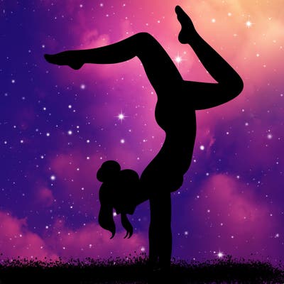 a woman doing a handstand