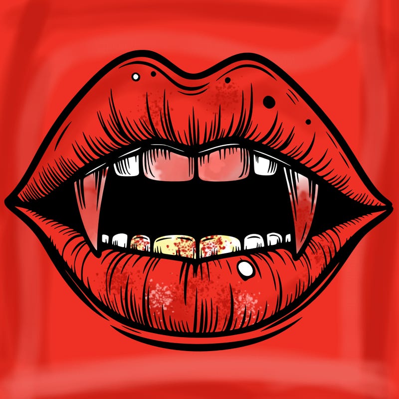 lips with vampire teeth