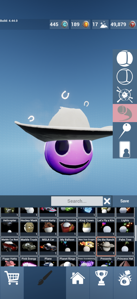 Marbles On Stream Mobile - A purple marble character being customized with a cowboy hat skin in the Marbles On Stream Mobile app.