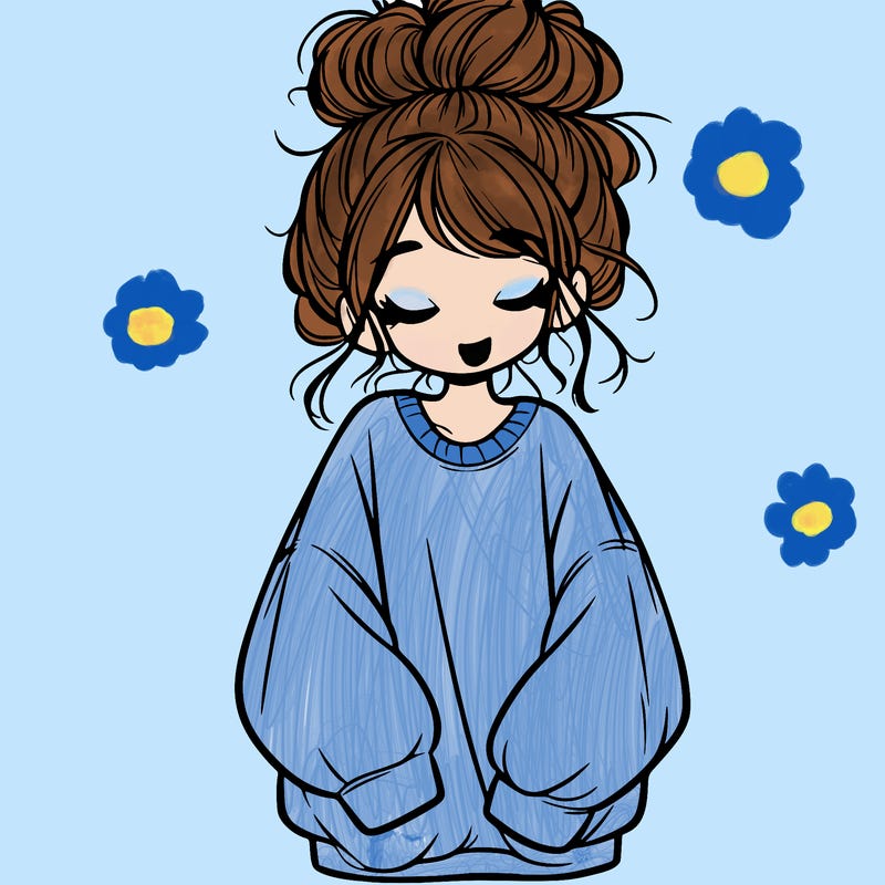 girl with baggy sweatshirt and messy bun