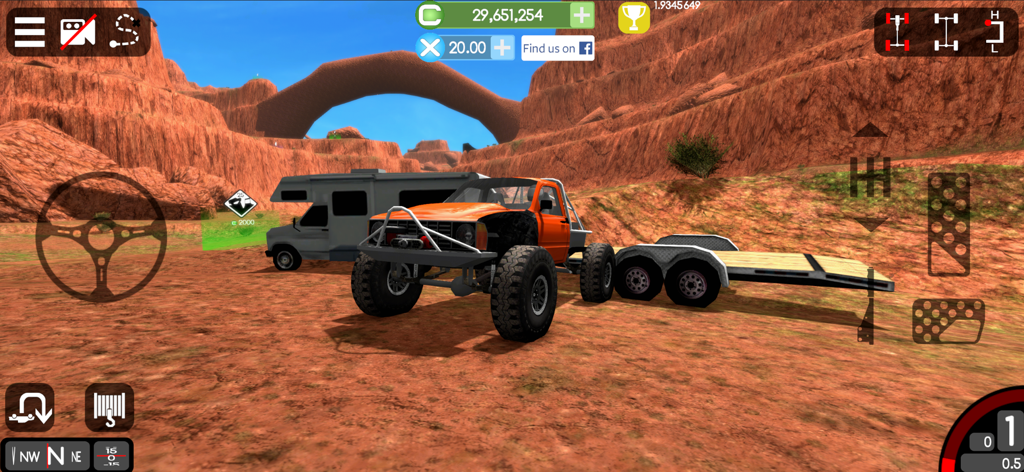 Gigabit Offroad - Customized orange off road truck pulling a trailer through a desert canyon