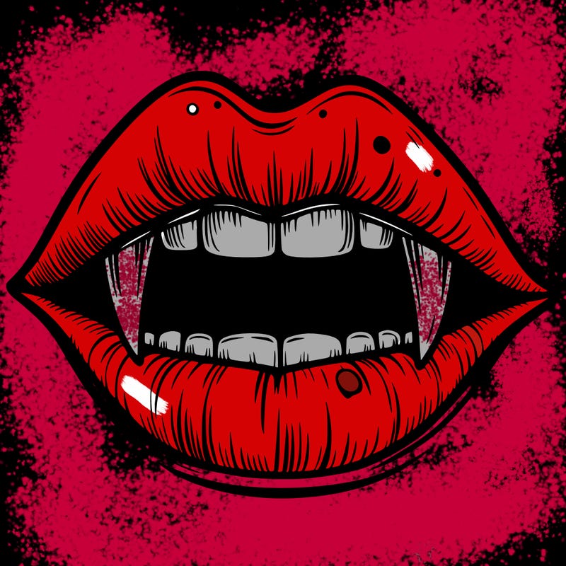 lips with vampire teeth