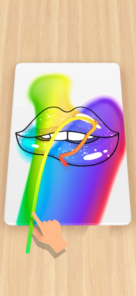 String Pull - A hand pulling a green string to create colorful rainbow lips art in a DIY simulation game