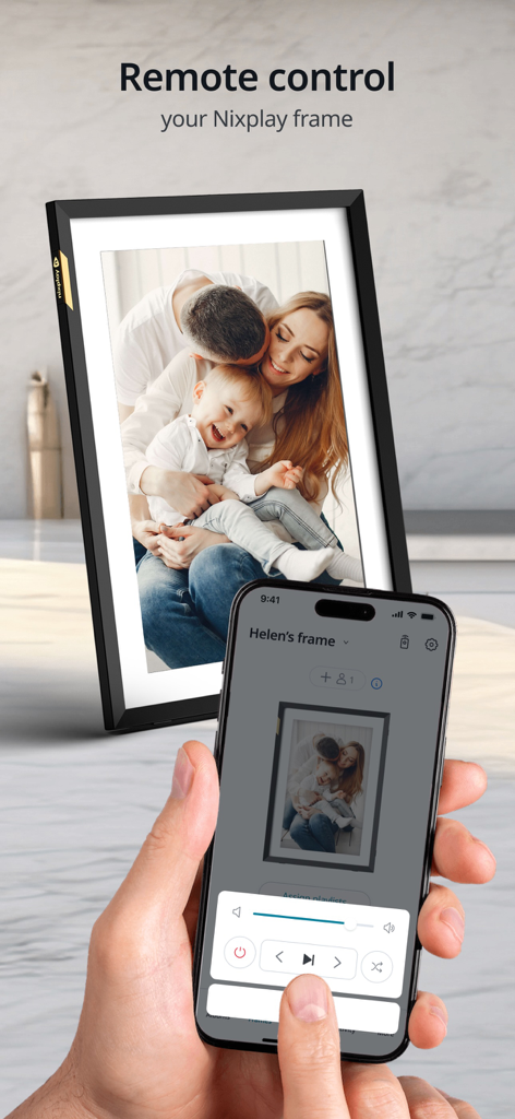A person using the Nixplay app on a smartphone to remote control a digital photo frame displaying a family photo.