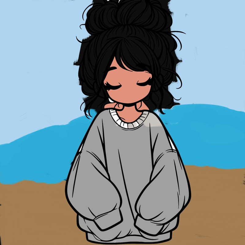 girl with baggy sweatshirt and messy bun