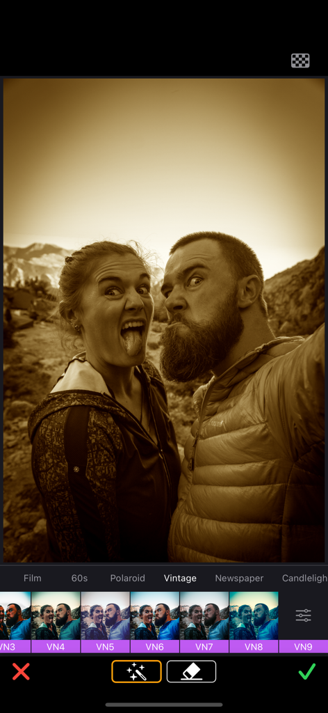 Interface of the ReColor app showing a vintage sepia filter applied to a photo of a couple making funny faces.