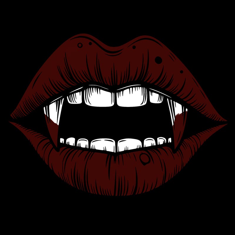 lips with vampire teeth