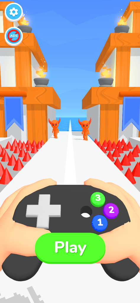The Mind Controller - Start screen of The Mind Controller mobile game showing a handheld controller and orange characters on a path with red spikes