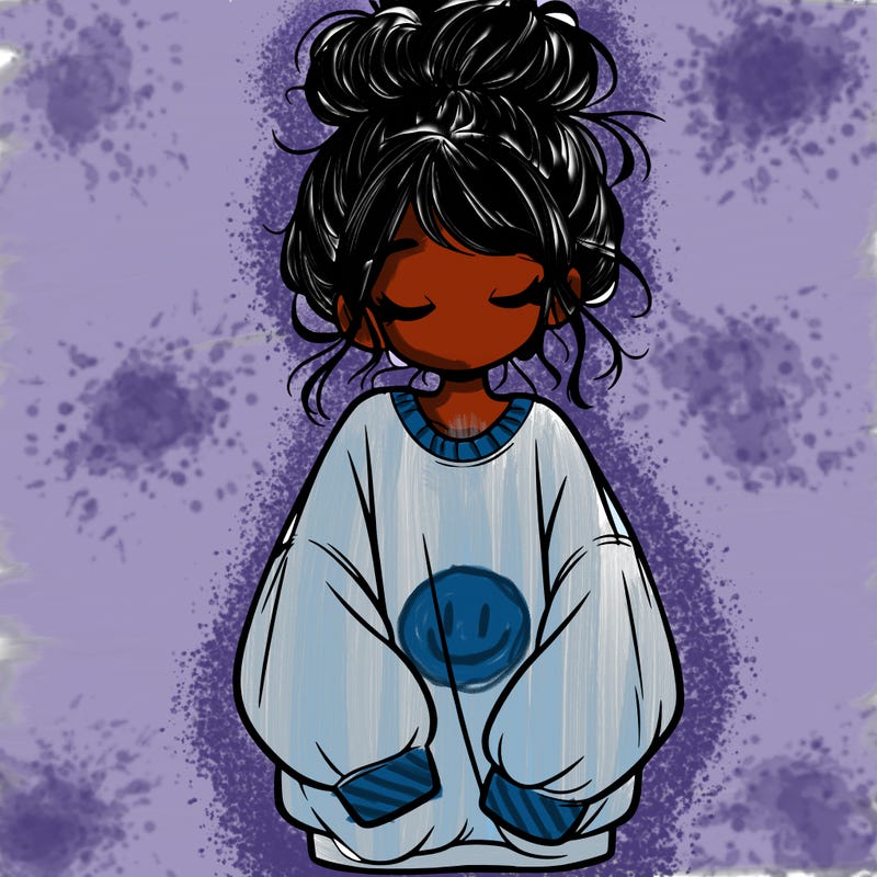 girl with baggy sweatshirt and messy bun