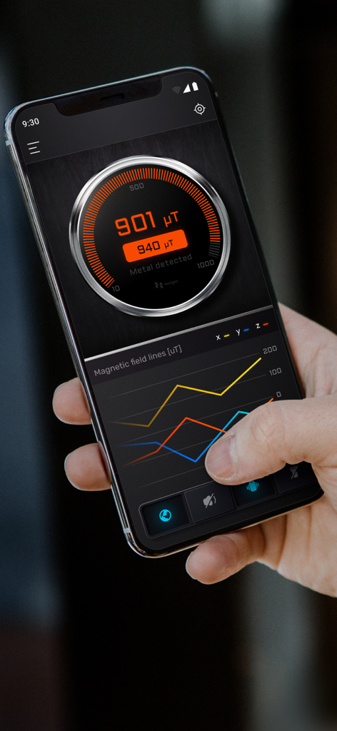 Smart Metal Detector - Pantalla de smartphone que muestra la aplicación Detector de Metales Inteligente con una medición de campo magnético de 901 microteslas y un gráfico en tiempo real