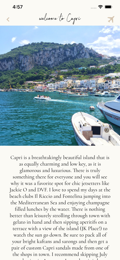 With Love From Kat Travel - カプリ島の海岸線の美しい写真とラグジュアリートラベルガイドが掲載された、With Love From Kat Travelアプリの画面。