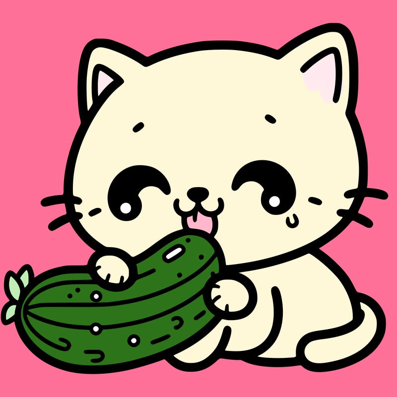 cat eating a cucumber
