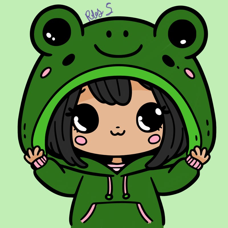 girl wearing a frog hoodie