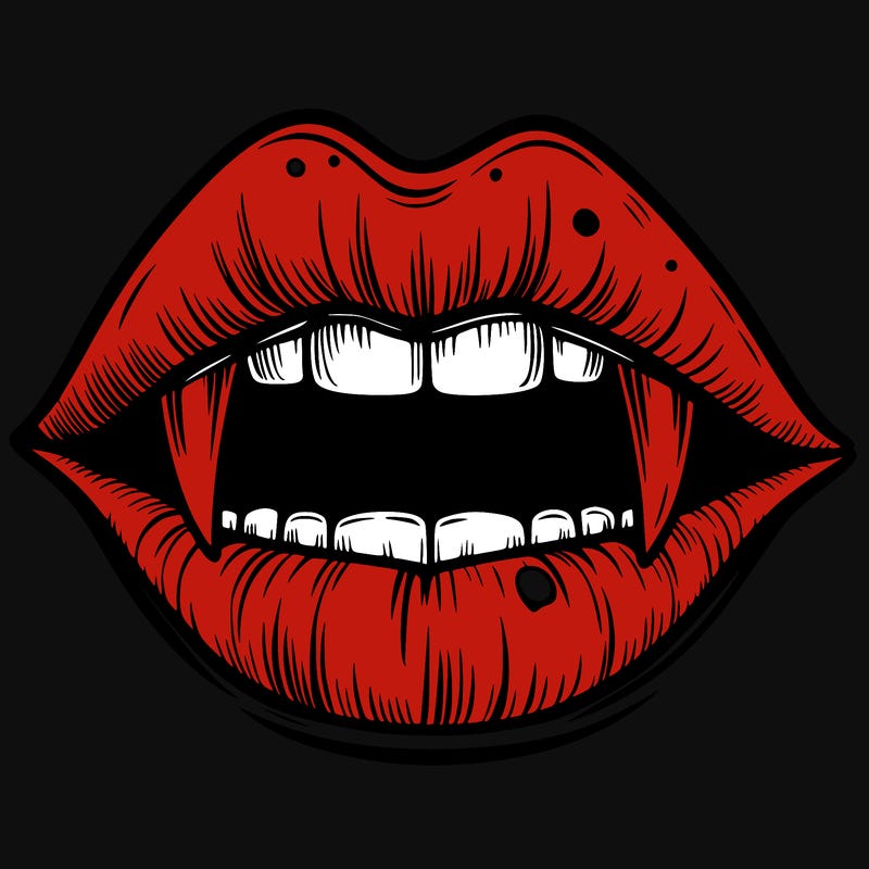 lips with vampire teeth