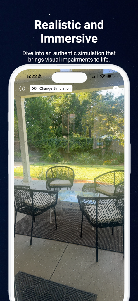 A smartphone screen displaying a realistic simulation of a visual impairment over a backyard patio scene.