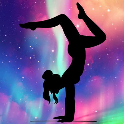 a woman doing a handstand