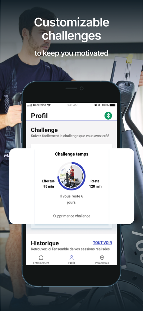 Domyos E Connected - Smartphone affichant des défis de fitness personnalisables dans l'application Domyos E Connected.