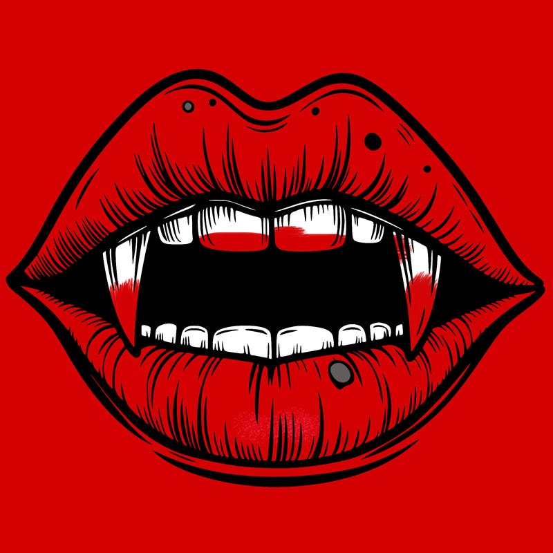 lips with vampire teeth