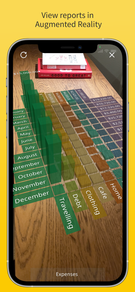 Money Pro: Personal Finance AR - A 3D bar chart showing monthly expenses in Augmented Reality on a tabletop