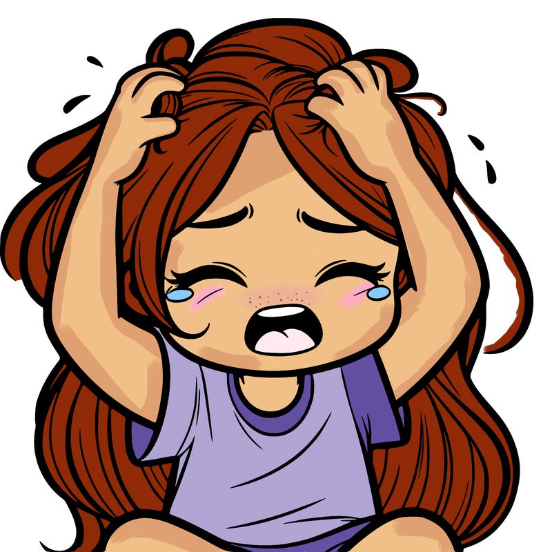 a girl grabbing her hair crying