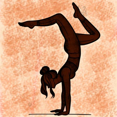 a woman doing a handstand